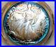 1986_American_Silver_Eagle_PCGS_MS68_Vibrant_Blue_Halo_Toned_2_Sided_Toning_01_cqtr