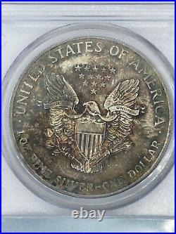 1986 American Silver Eagle with Rainbow Toning PCGS MS-67