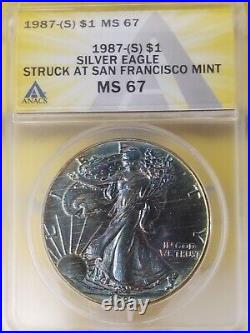 1987 American $1 Silver Eagle 1 oz. Fine 999 ANACS MS67 Blue & Gold Toned