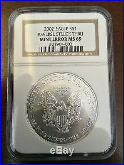 2002 USA $1 Silver Eagle REVERSE STRUCK THRU MINT ERROR MS 69 NGC Coin