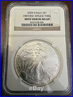2005 USA $1 Silver Eagle OBVERSE STRUCK THRU MINT ERROR MS 69 NGC Coin