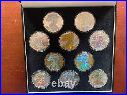 Beautiful Display Box of 10.999 Silver American Eagles 2004 Gold Foil
