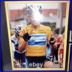 Lance Armstrong Autographed American Silver Eagle Coin Framed Photo & Bracelet