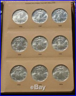 SILVER AMERICAN EAGLE COLLECTION (32 COINS) in a DANSCO ALBUM MISSING 2011